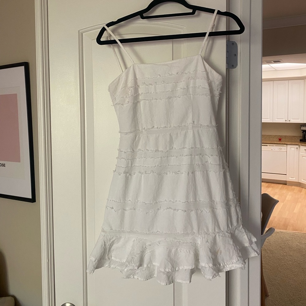 White linen ruffle mini dress